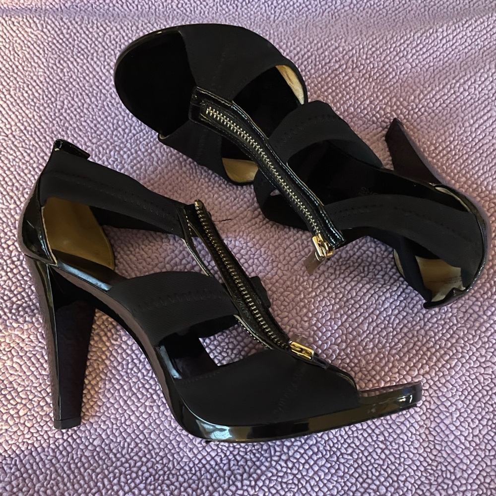 Michael Kors heels size 8. Worn once and in excellent condition.
